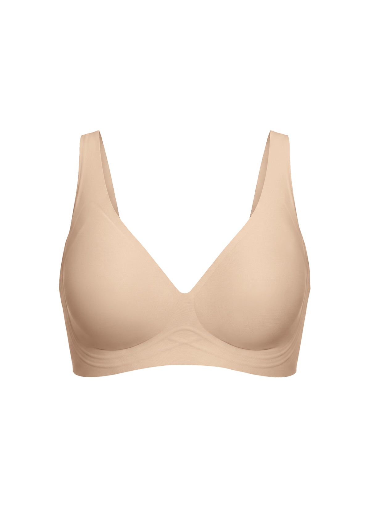 A seamless, wireless bra in a light beige nude color, shown against a plain white background.