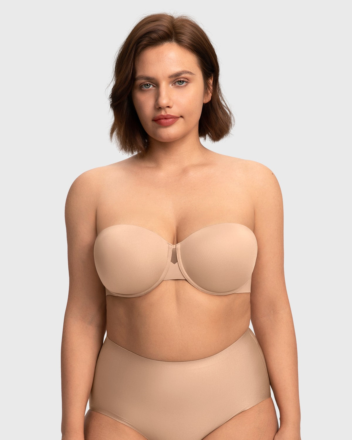 Front view of the almond skin strapless bra, serving as an excellent, seamless choice for large breasts under light-colored clothing.