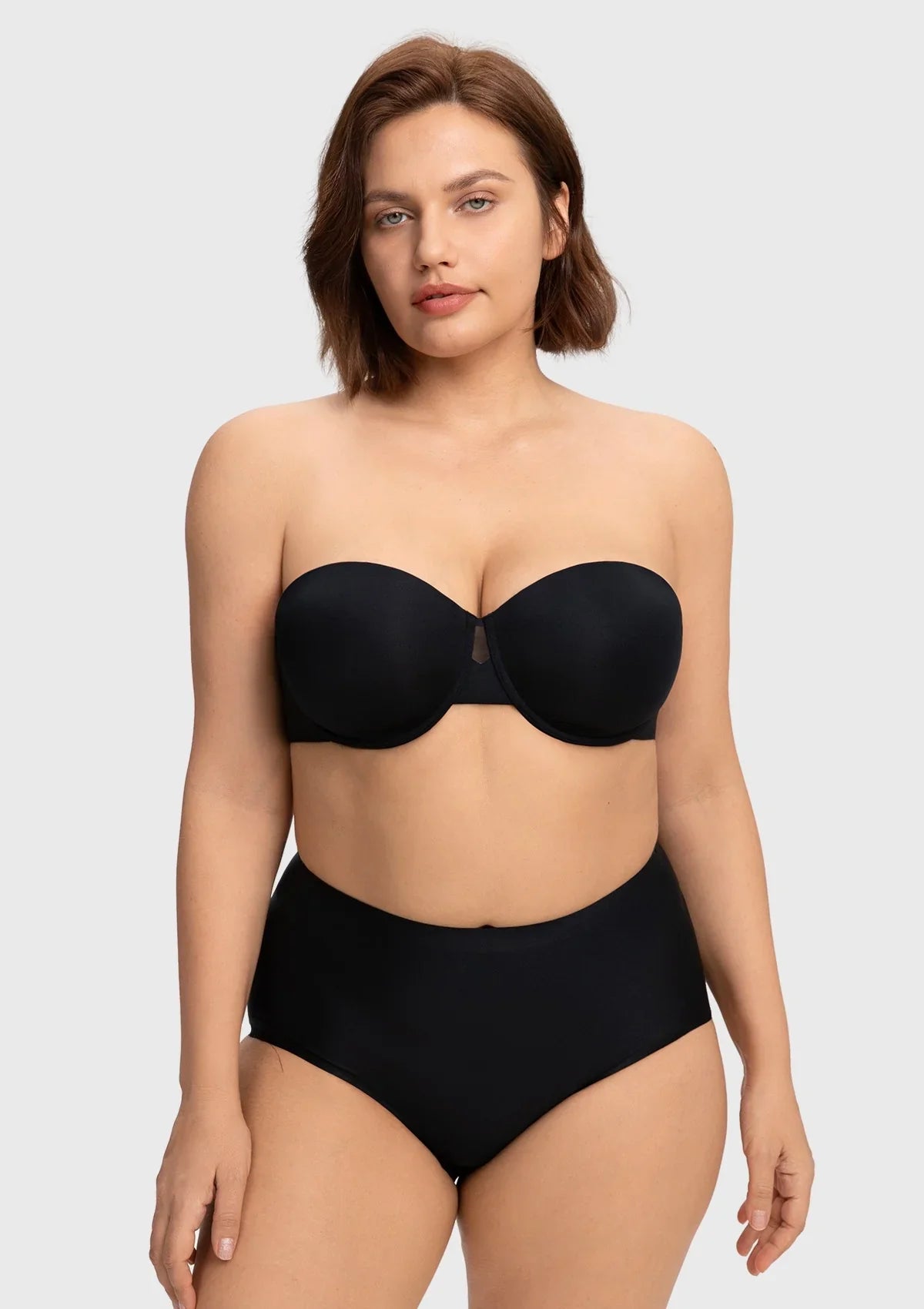 Front view of the black silicone-free strapless bra, offering a flawless, invisible lift and making it the best strapless bra for large breasts.