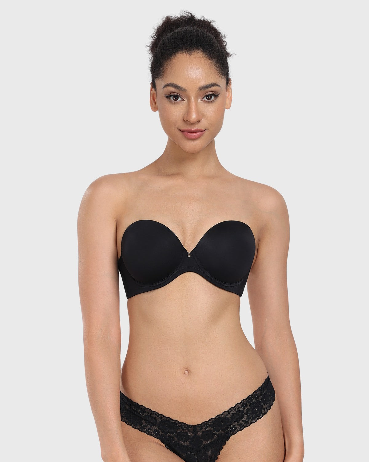 Front view of the black strapless bra, offering elegant lift and secure containment as the perfect bra for off the shoulder dress and evening wear.
