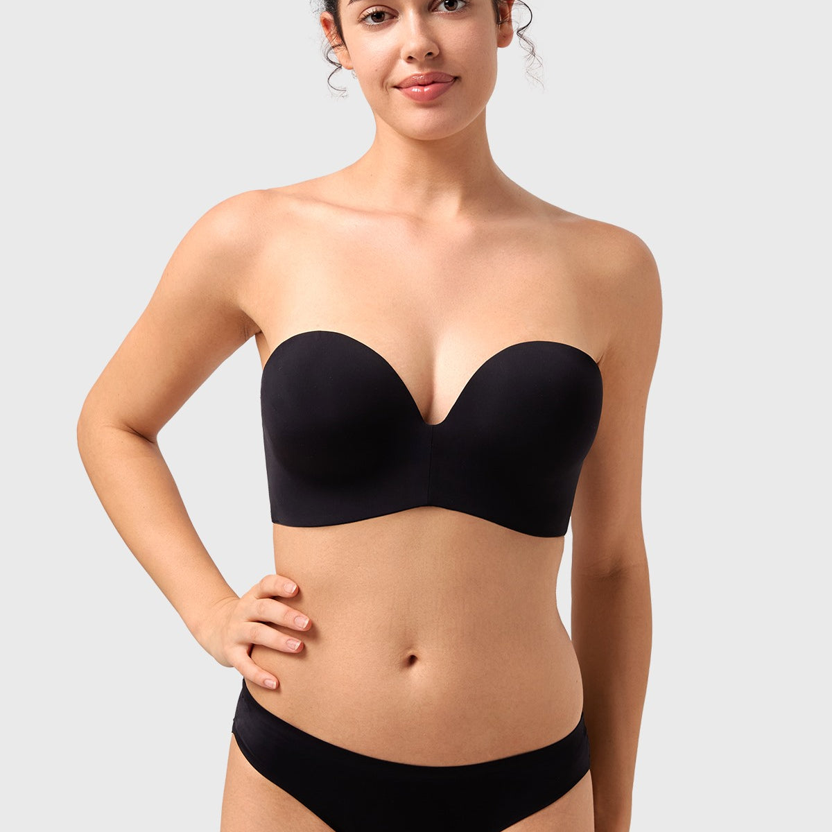 Front view of the black strapless bra, the perfect reliable bra for off the shoulder dress and elegant evening wear.