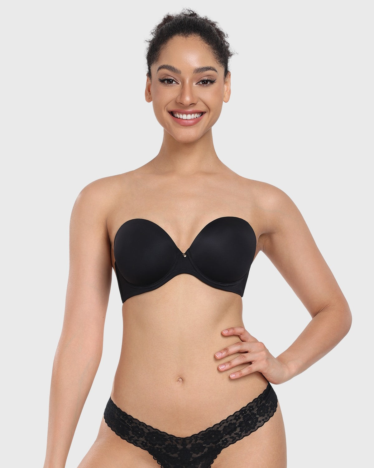 Front view of the black strapless bra, offering elegant lift and secure containment as the perfect bra for off the shoulder dress and evening wear.