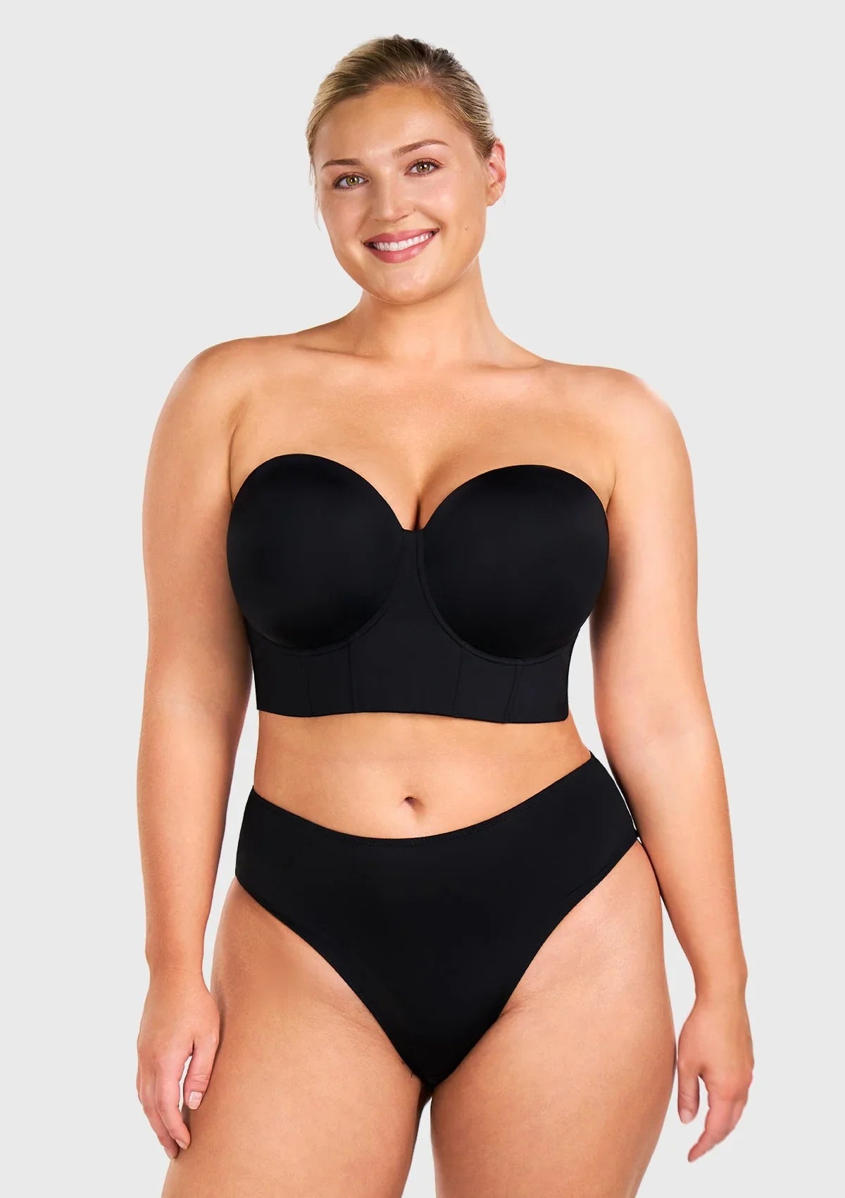 Front view of the black strapless bra, serving as the perfect elegant bra for off the shoulder dress and evening wear.
