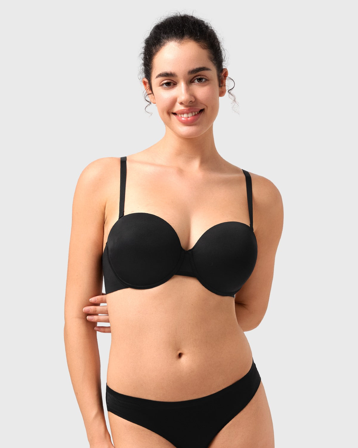 Front view of the black multiway underwire bra with traditional straps attached, offering comfortable and secure push-up support for daily wear.