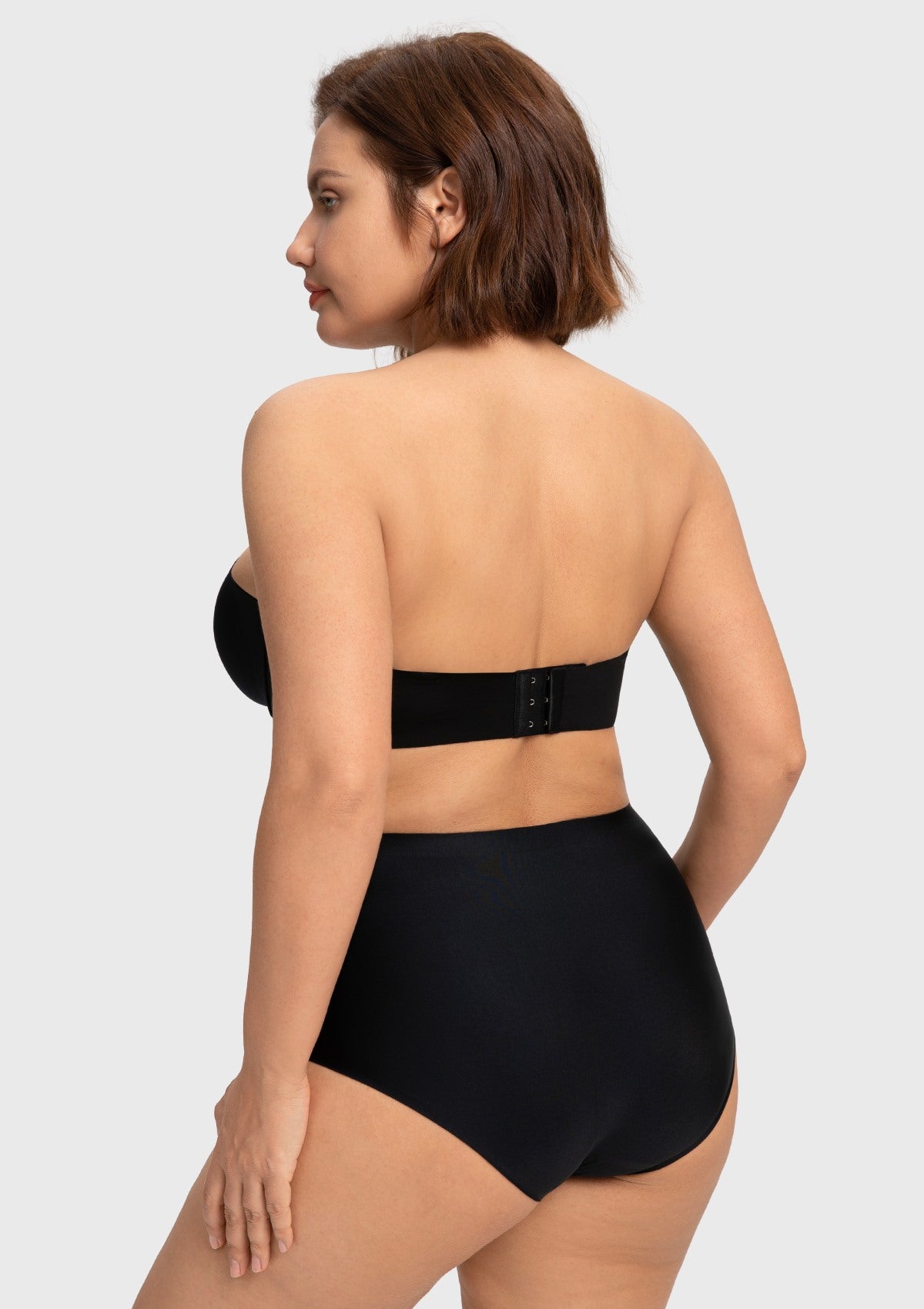 Rear view of the black seamless strapless bra, featuring a comfortable, breathable band for a smooth, bulge-free silhouette.
