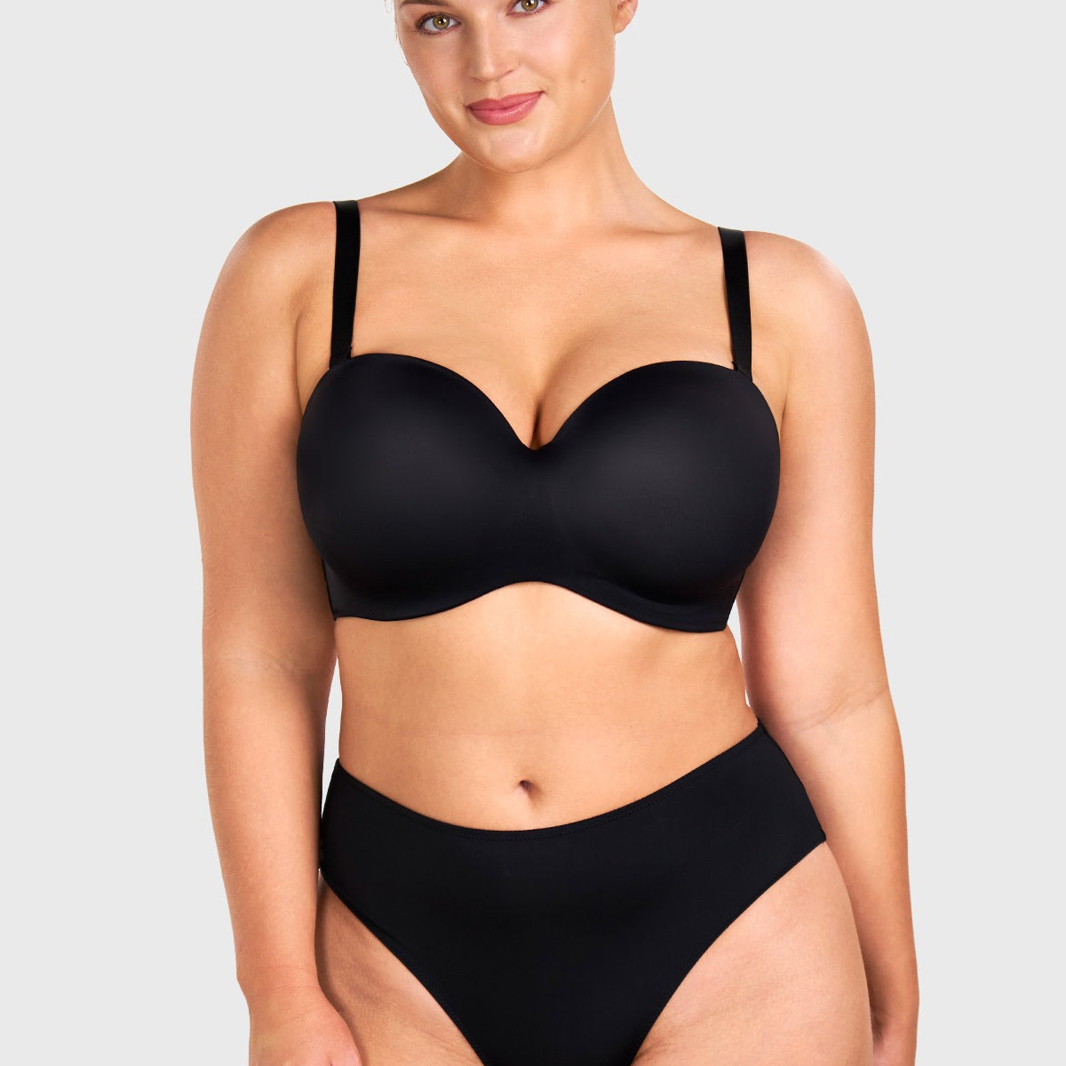 Front view of woman wearing the black HSIA seamless non-slip strapless bra