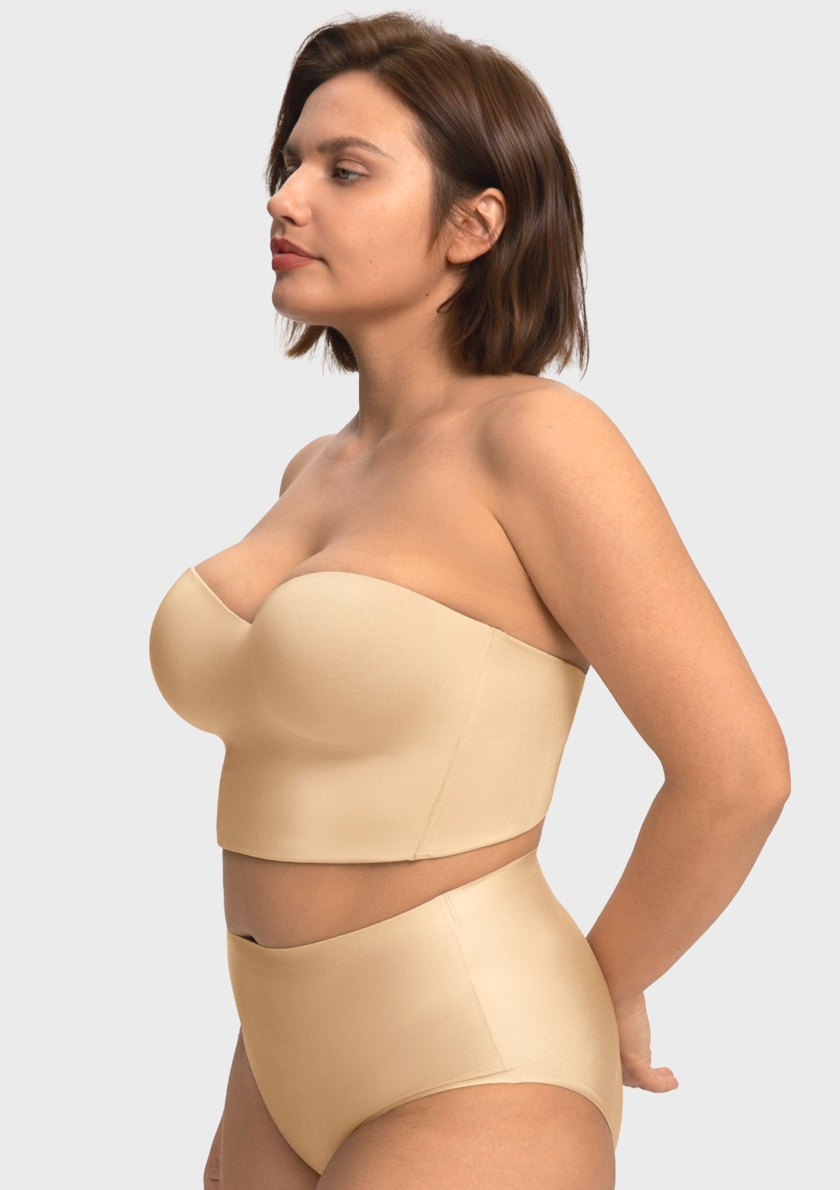 Side profile of the champagne smooth satin balconette corset bra, expertly contoured to embrace and sculpt full figures.