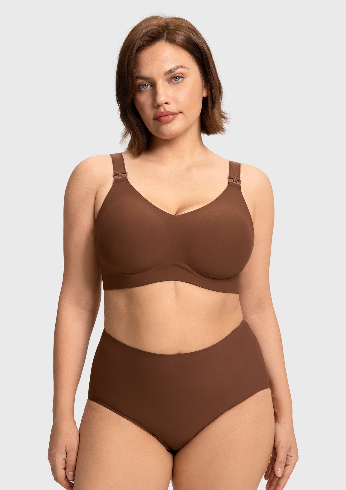 Front view of a model in the cocoa brown SoftContour seamless nursing bra, offering a silky-soft second-skin feel and elegant V-neckline for mothers.