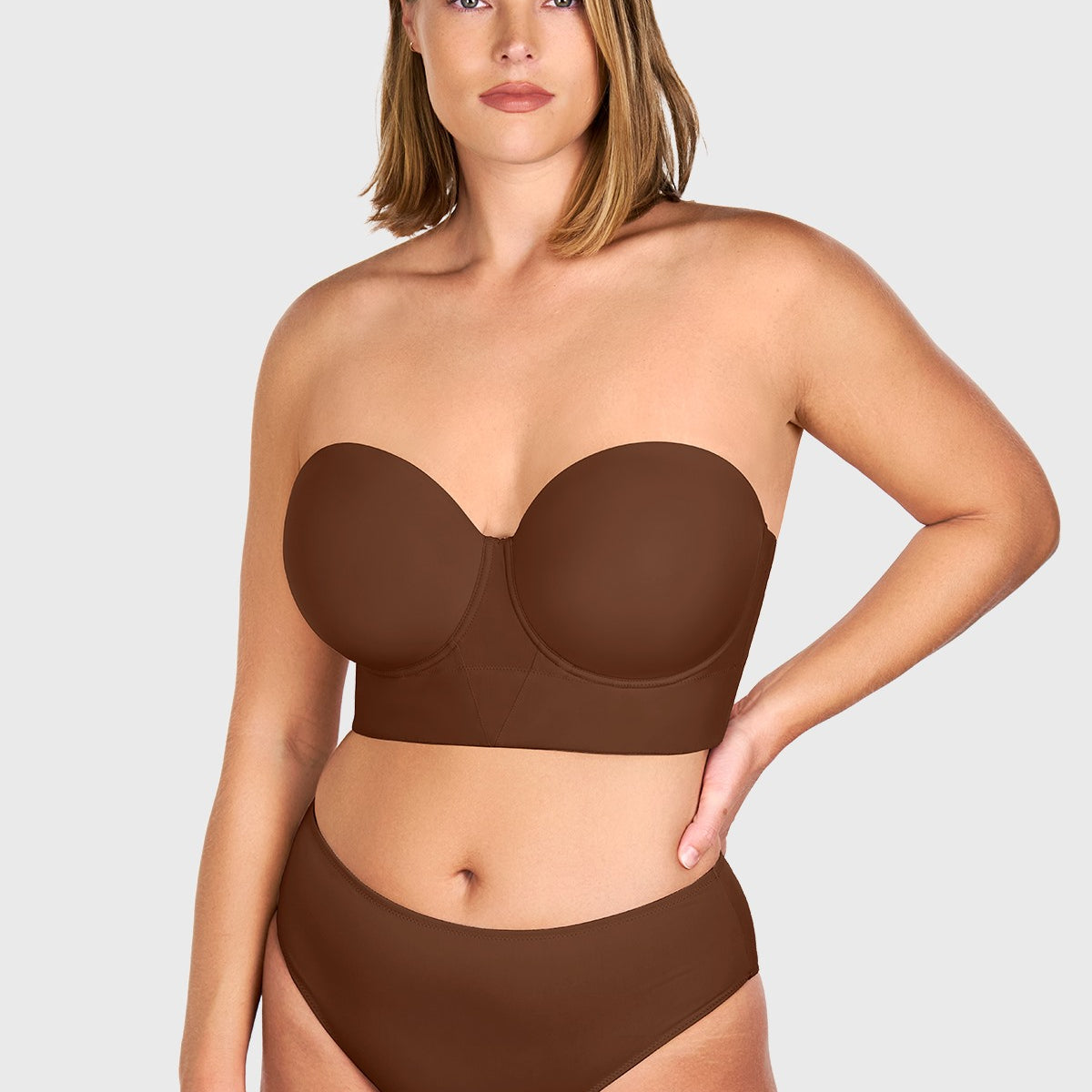 Front view of the coffee brown longline strapless balconette bra, acting as the perfect invisible nude bra for darker skin tones.