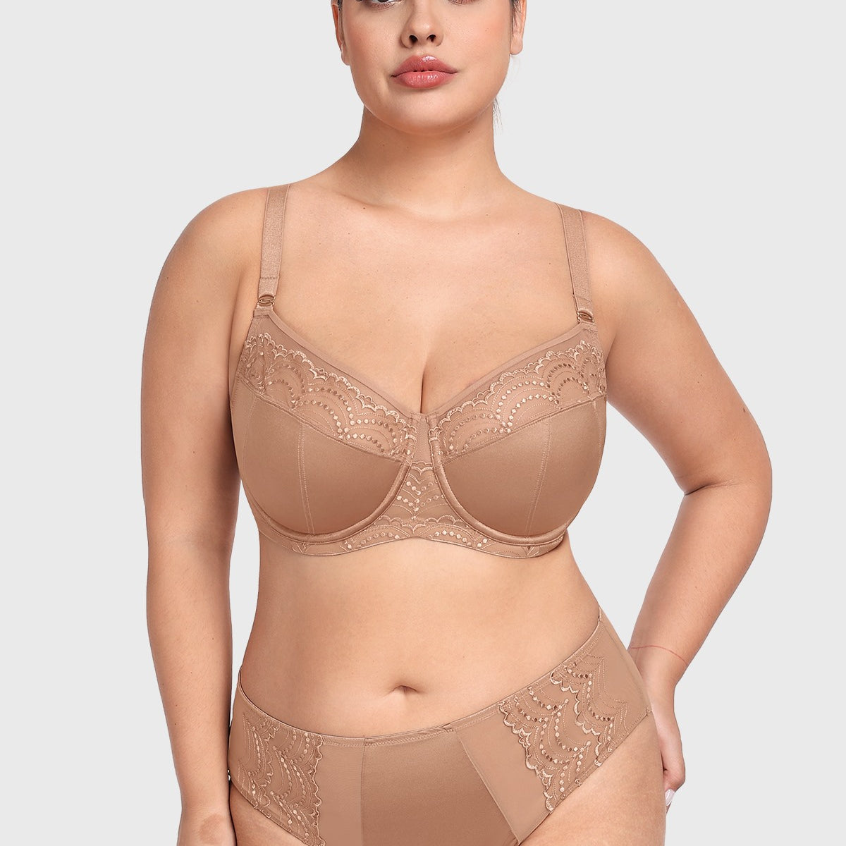 Front view of the dark beige embroidered lace balconette bra, showcasing a romantic unlined lift and sheer elegance for fuller figures.