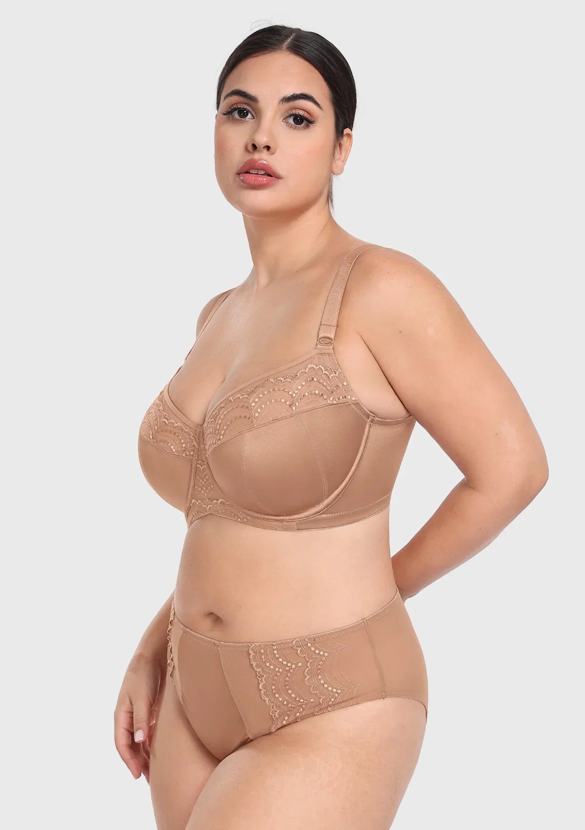 45-degree angle of the dark beige side sling support bra, highlighting how the hidden mesh sling gently pushes breast tissue forward for a slimming effect.