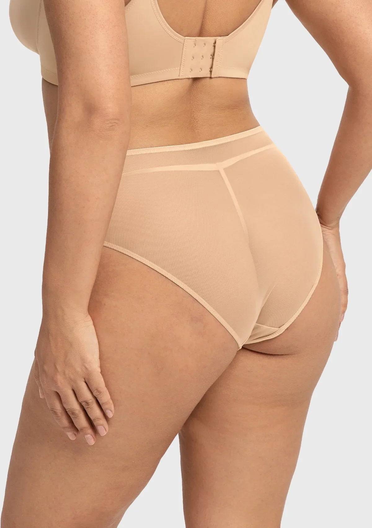 Back view of the Light Beige Dahlia panty, featuring a thoughtfully extended 100% cotton gusset for superior hygiene and comfort.