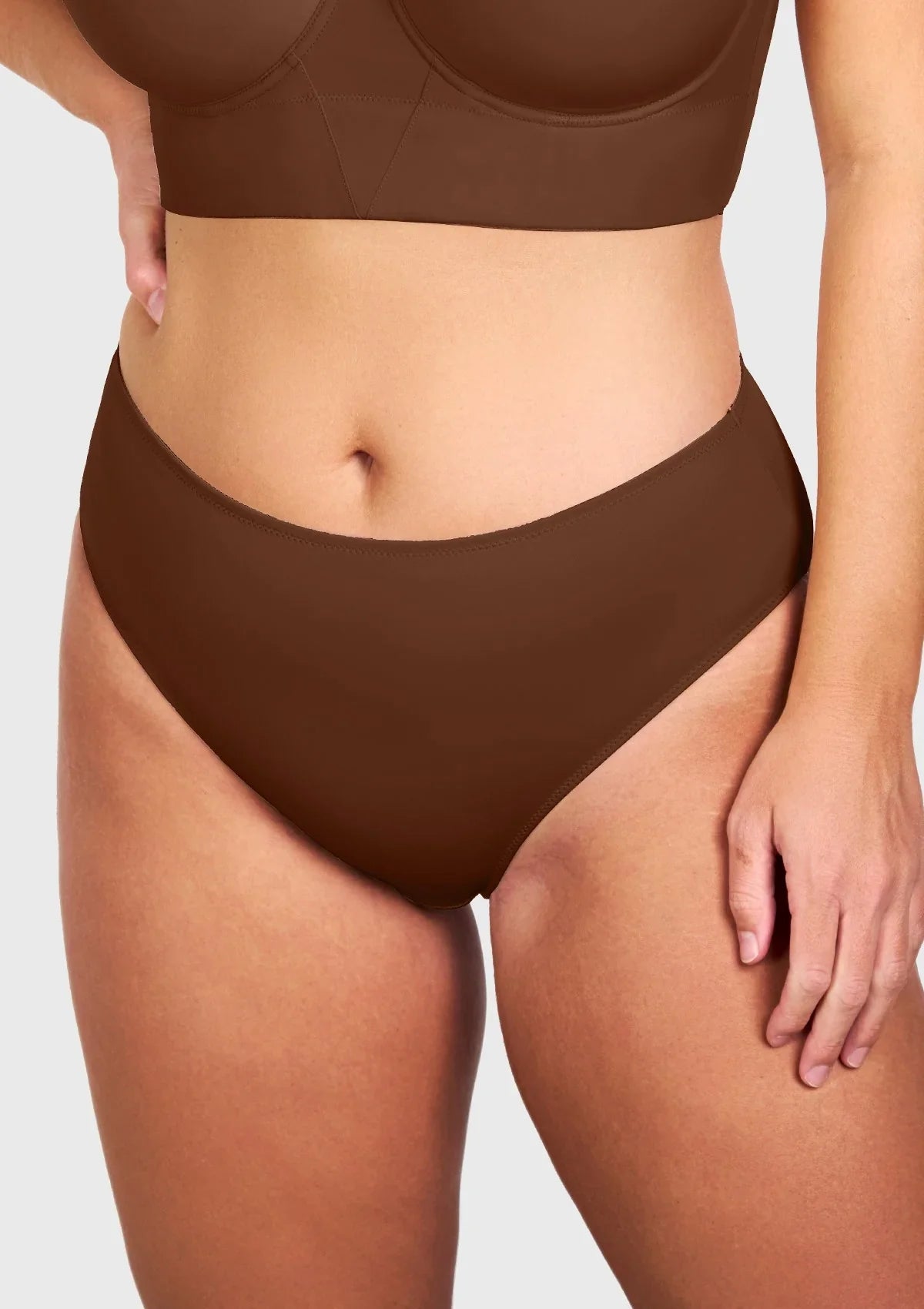 Front view of model wearing the HSIA coffee brown modern high brief panty, featuring a soft elastic waist that never digs in.