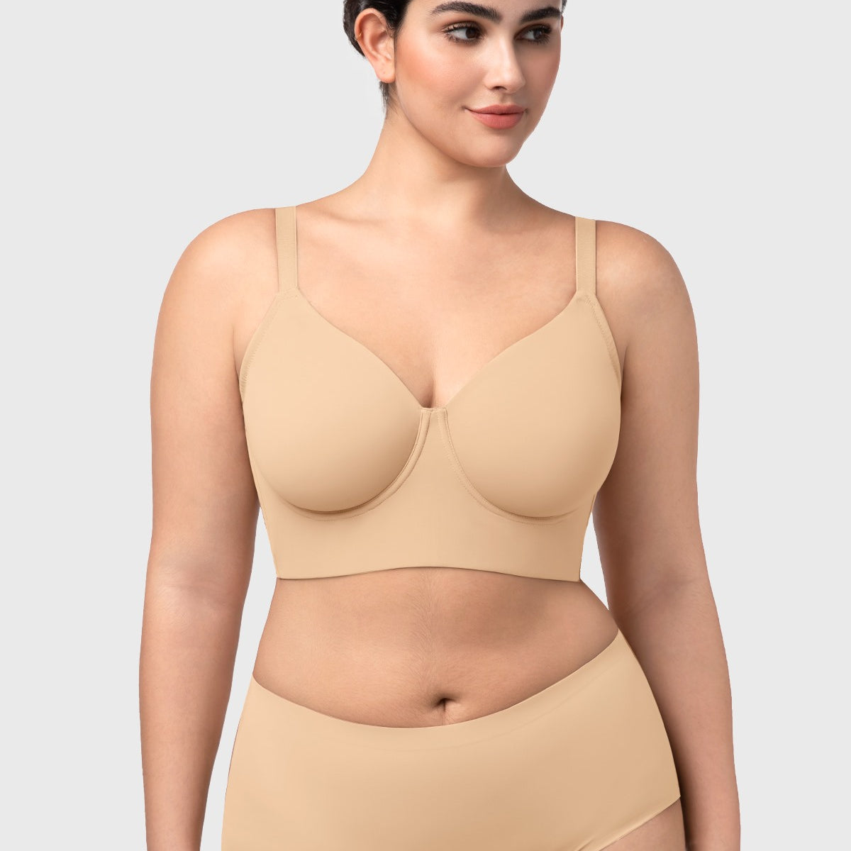 Front view of the HSIA beige Delia longline seamless T-shirt bra, a smooth wearable tank designed for fuller busts.