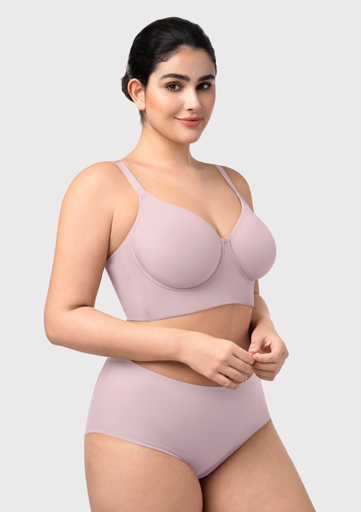 Side profile of the gray purple Delia longline bra, showing the smoothing effect and gentle forward push for a lifted silhouette.