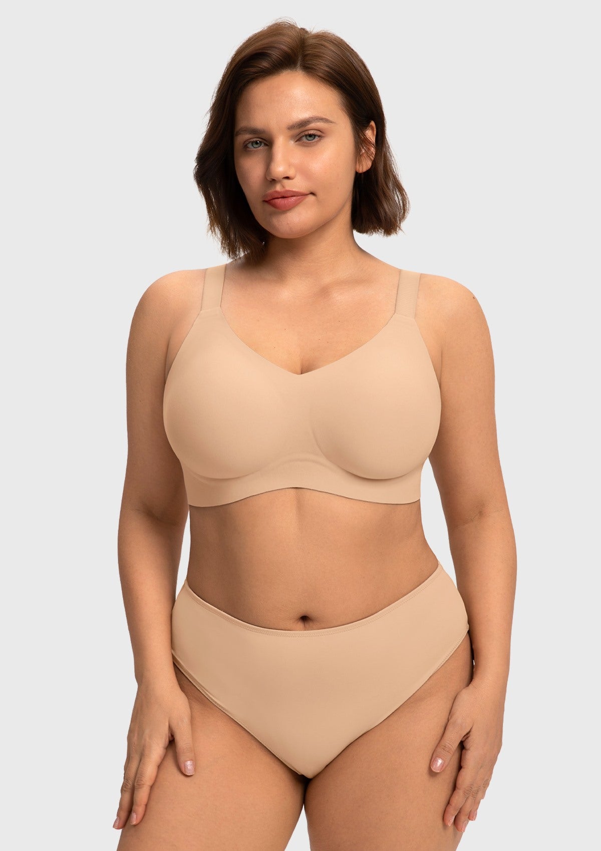 Front view of model in the Light Beige HSIA SoftTouch wireless bra, an invisible everyday foundation perfectly designed for a supportive everyday fit.