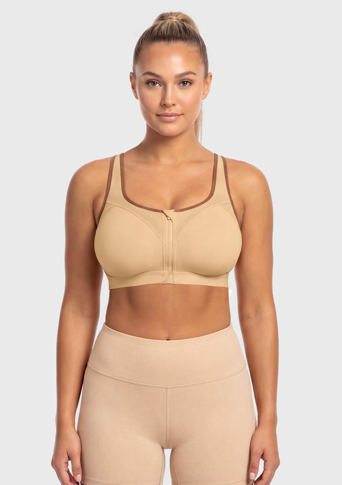 Front view of model wearing the Warm Beige HSIA front closure sports bra, delivering heavy-duty lockdown support and effortless on-and-off convenience.