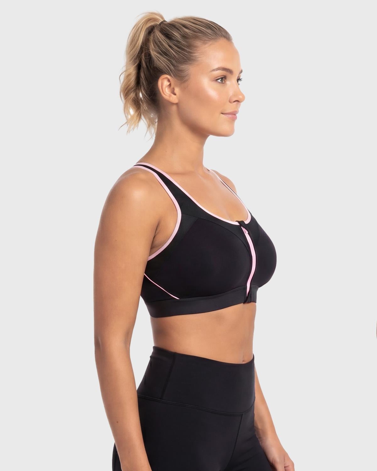 Side angle of the Black high impact sports bra, illustrating the wireless full-coverage encapsulation and wide padded straps designed for big busted women.