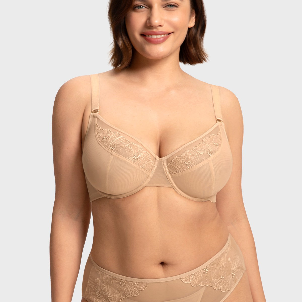 Front view of model wearing the Light Beige HSIA Yumi unlined bra, an everyday essential providing an alluring sheer look and full coverage support.