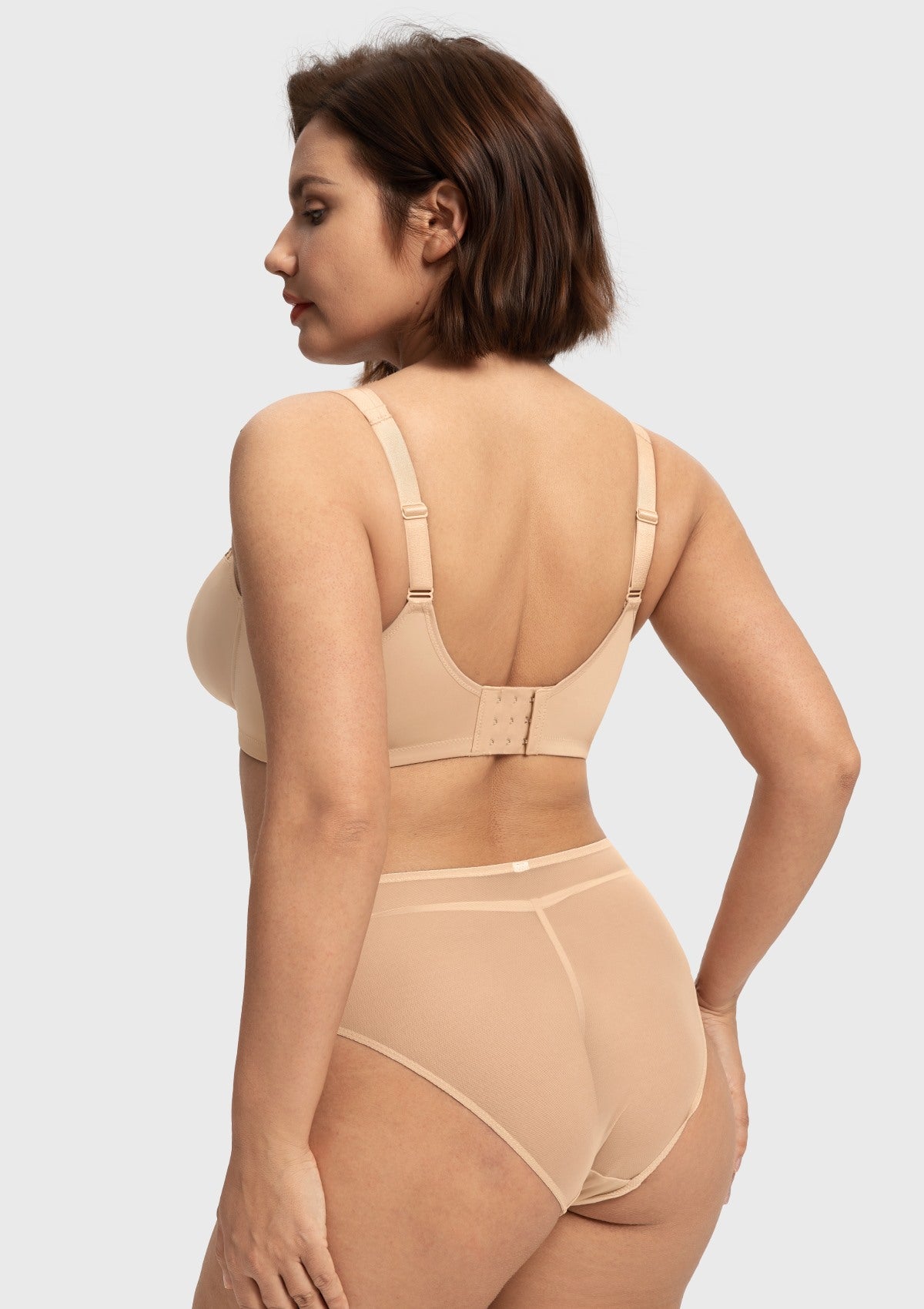 Rear view of the light beige full coverage bra, featuring a breathable power mesh back band and zero-pressure wide straps for all-day comfort.