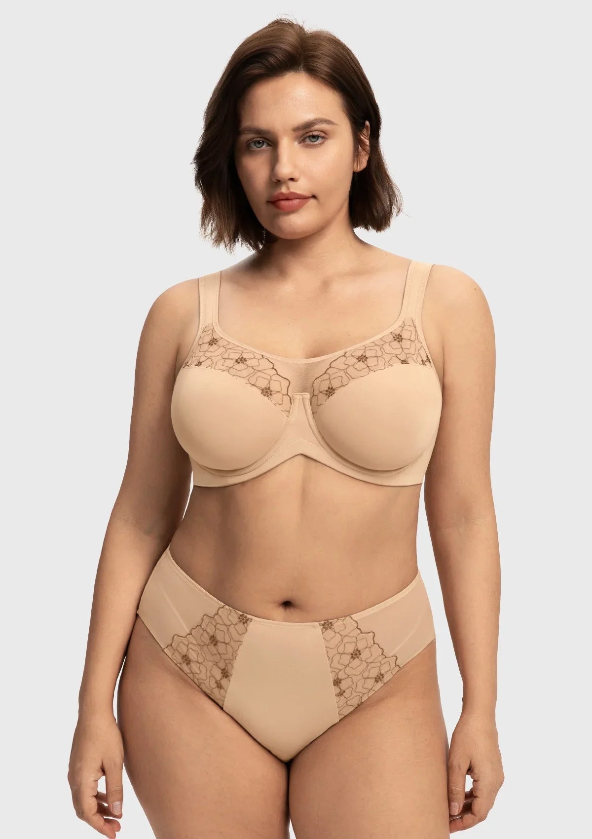 Front view of the light beige embroidered lace full coverage bra, offering a seamless, elegant look with uncompromising support for fuller figures.