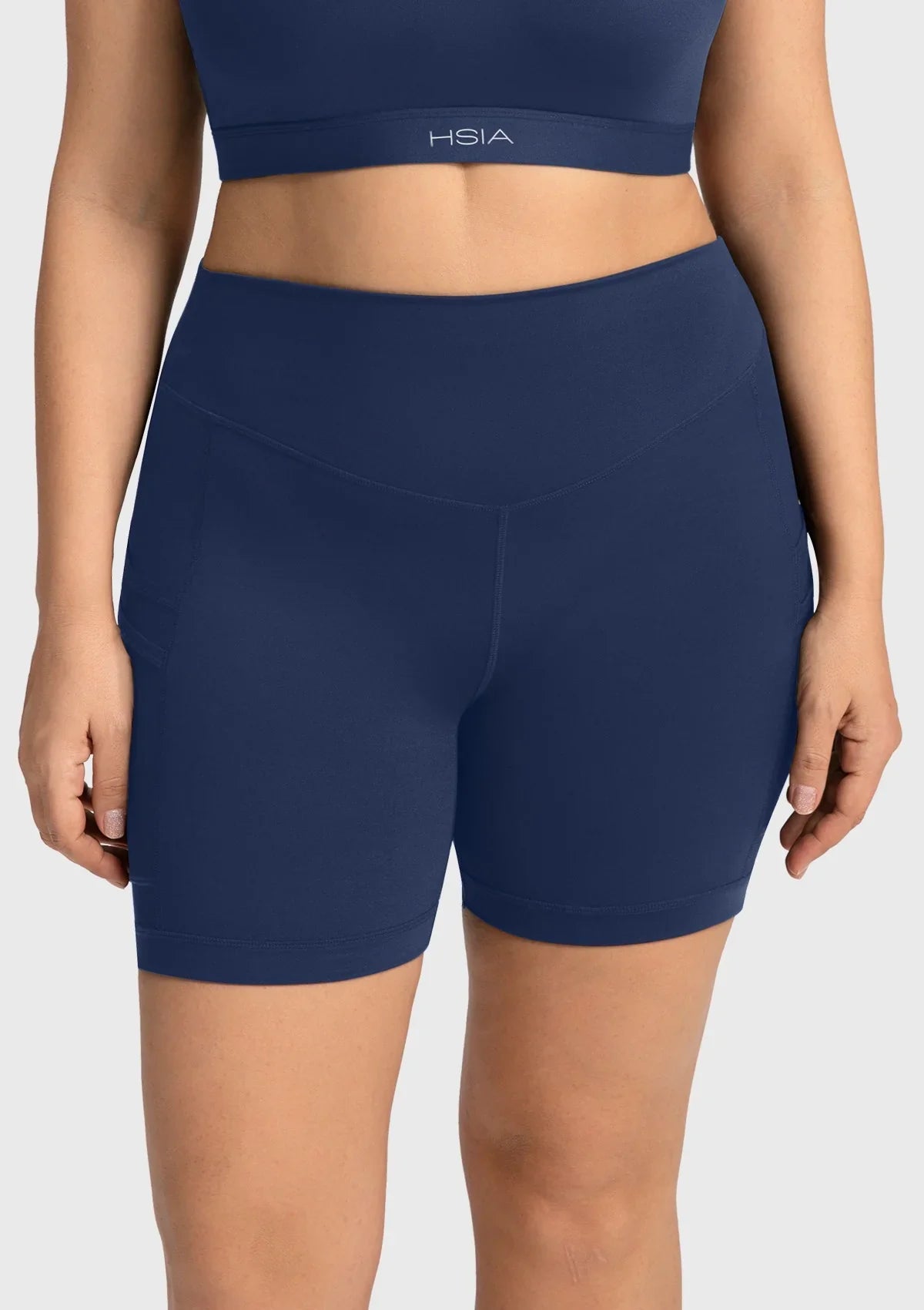 Full front view of the navy blue athletic shorts, offering a highly stretchy, comfortable fit that is plus size friendly up to 4XL.