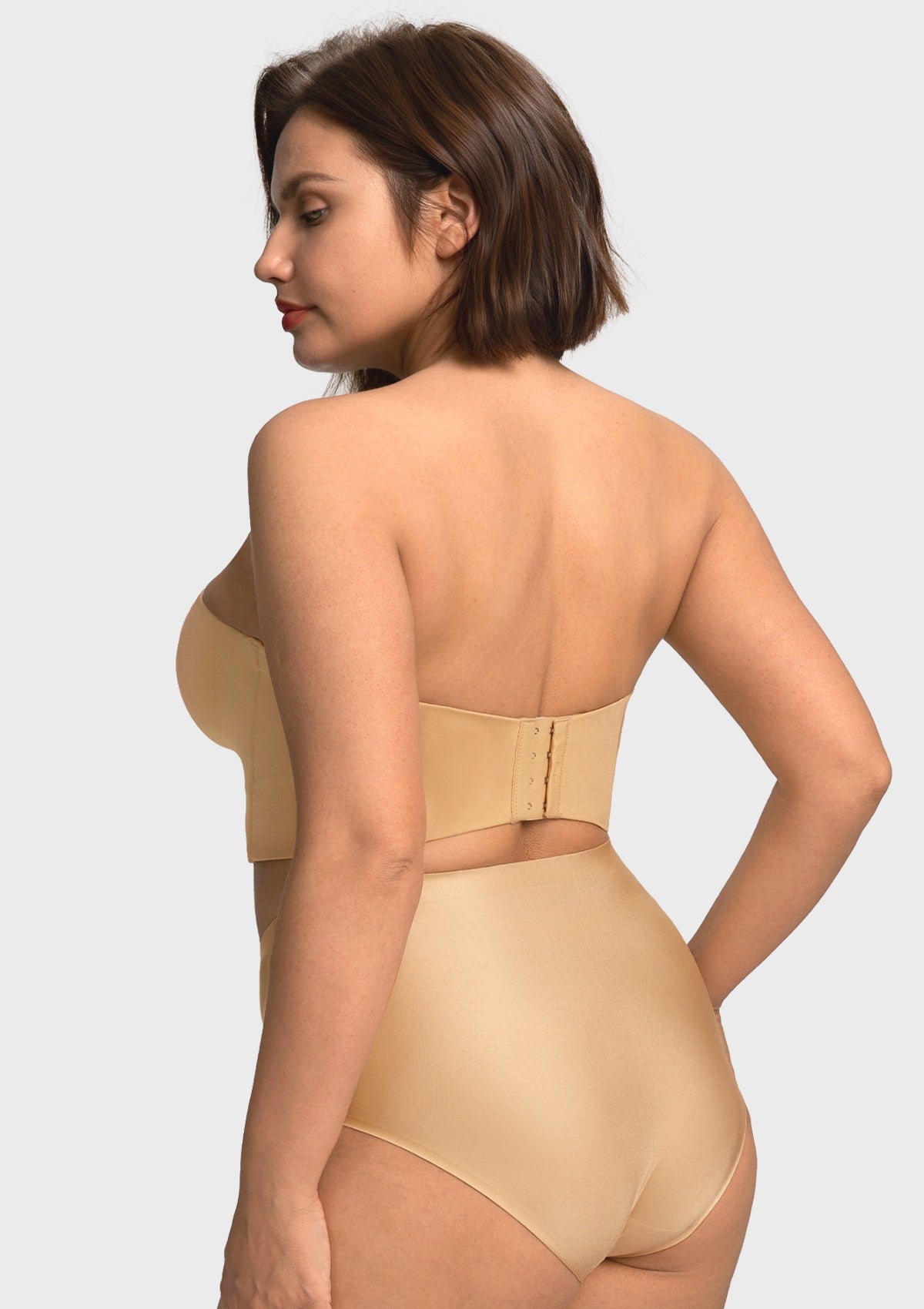 Rear view of the nude back smoothing corset bra, featuring an ultra-wide band with multi-row hooks that stays secure all day.