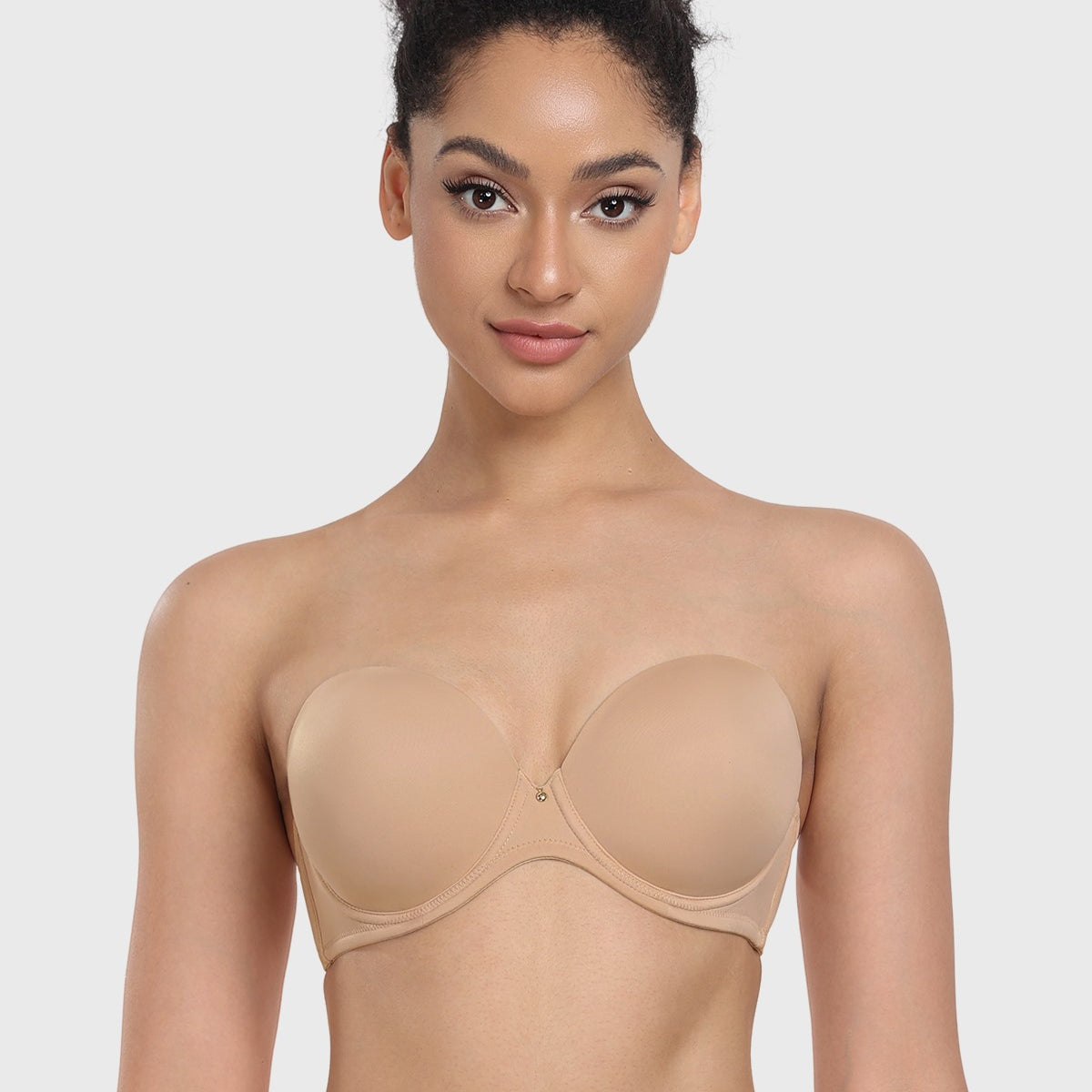 Front view of the light nude full coverage strapless bra, providing an invisible, secure fit under wedding gowns and light-colored dresses.