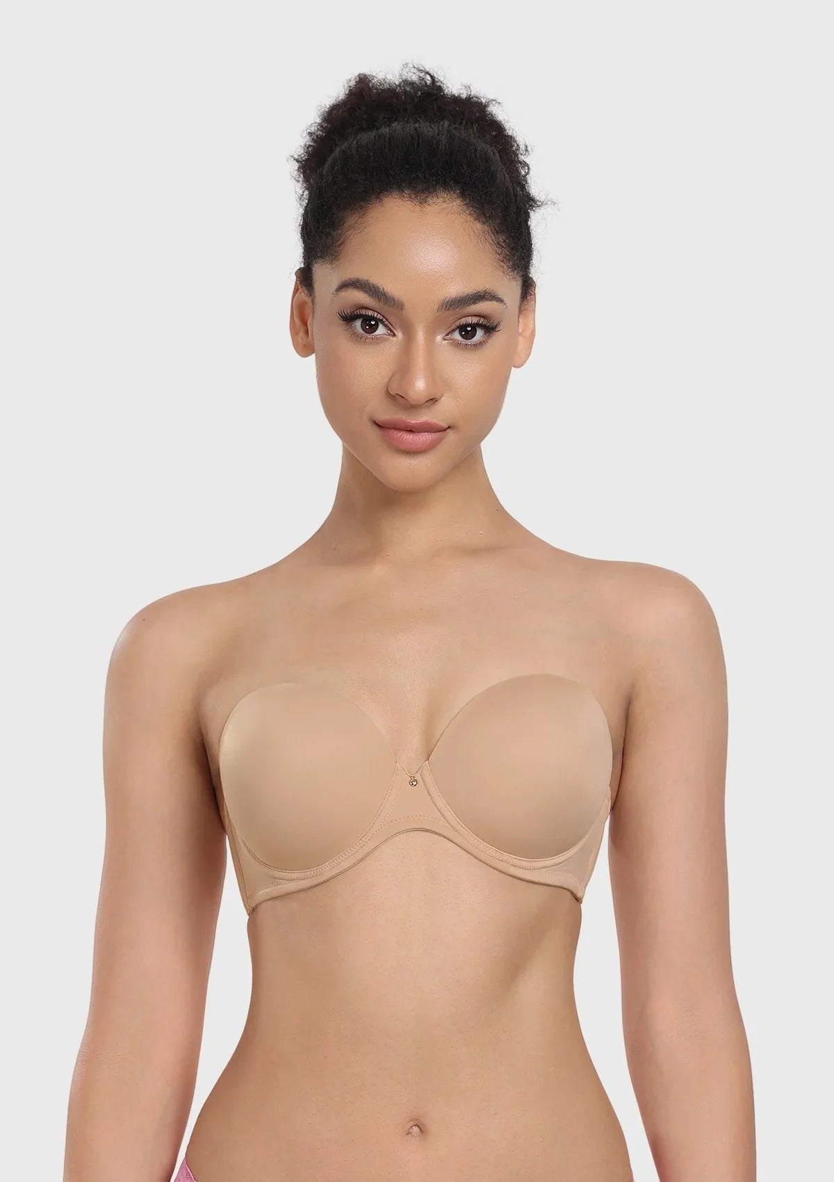 Front view of the light nude full coverage strapless bra, providing an invisible, secure fit under wedding gowns and light-colored dresses.