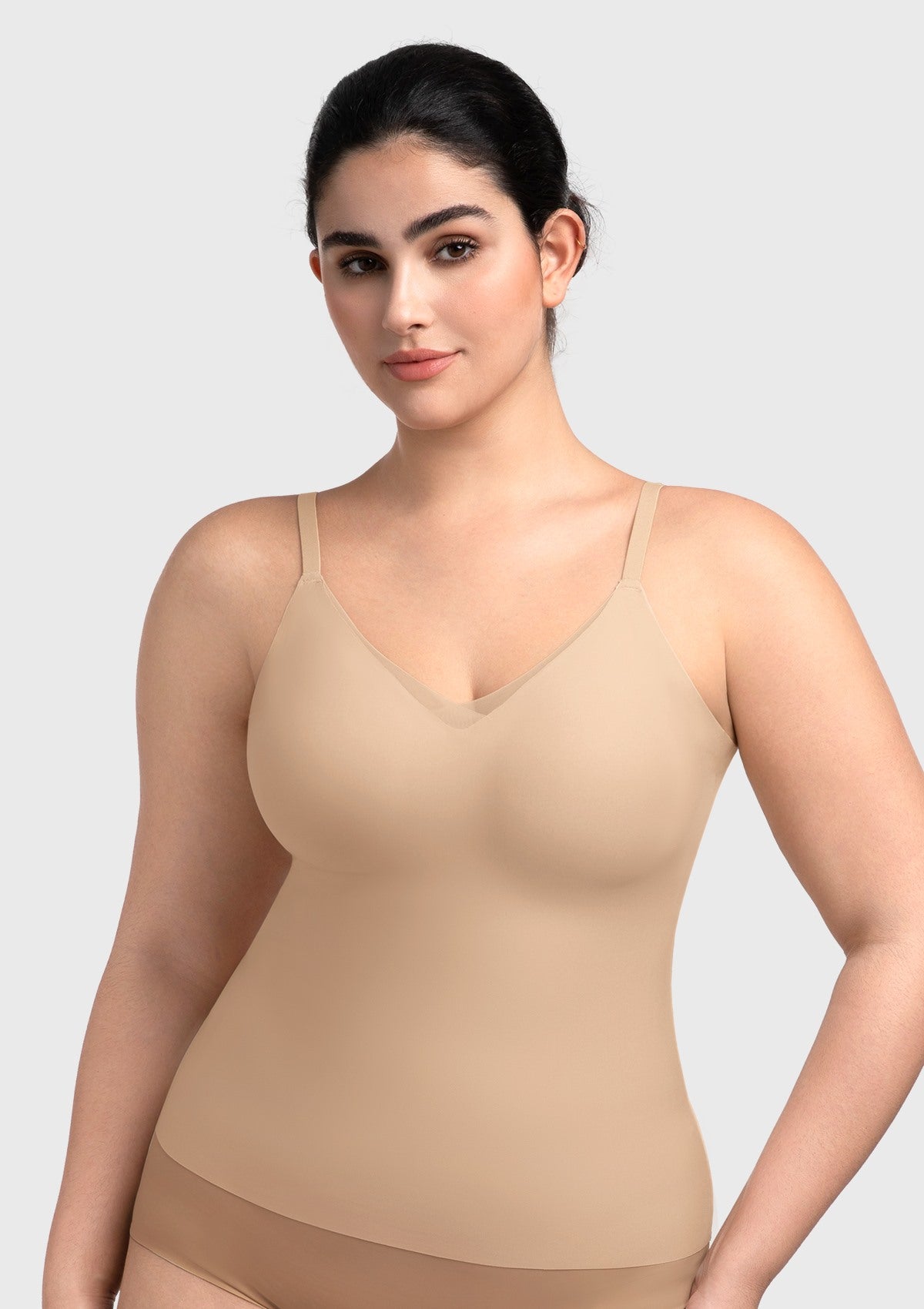 Front view of the nude seamless camisole with a built-in bra, offering a true naked sensation and perfect invisibility under sheer tops.