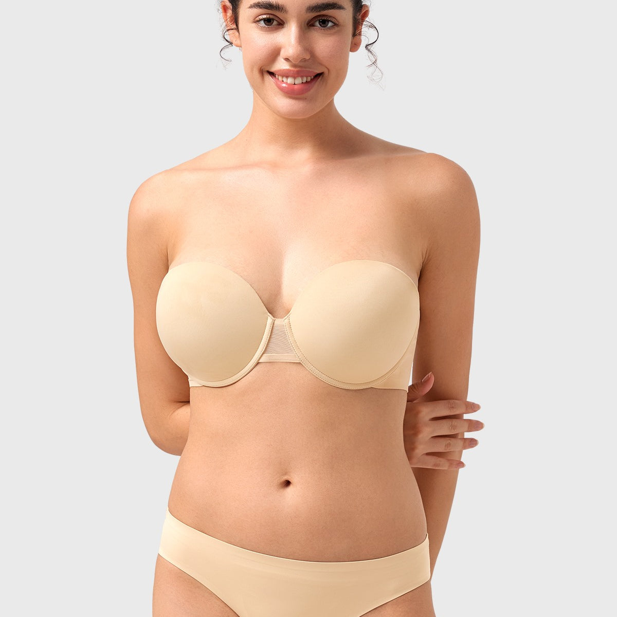 Front view of the nude seamless push-up strapless bra, offering a flawless, invisible lift for your favorite shoulder-baring outfits.
