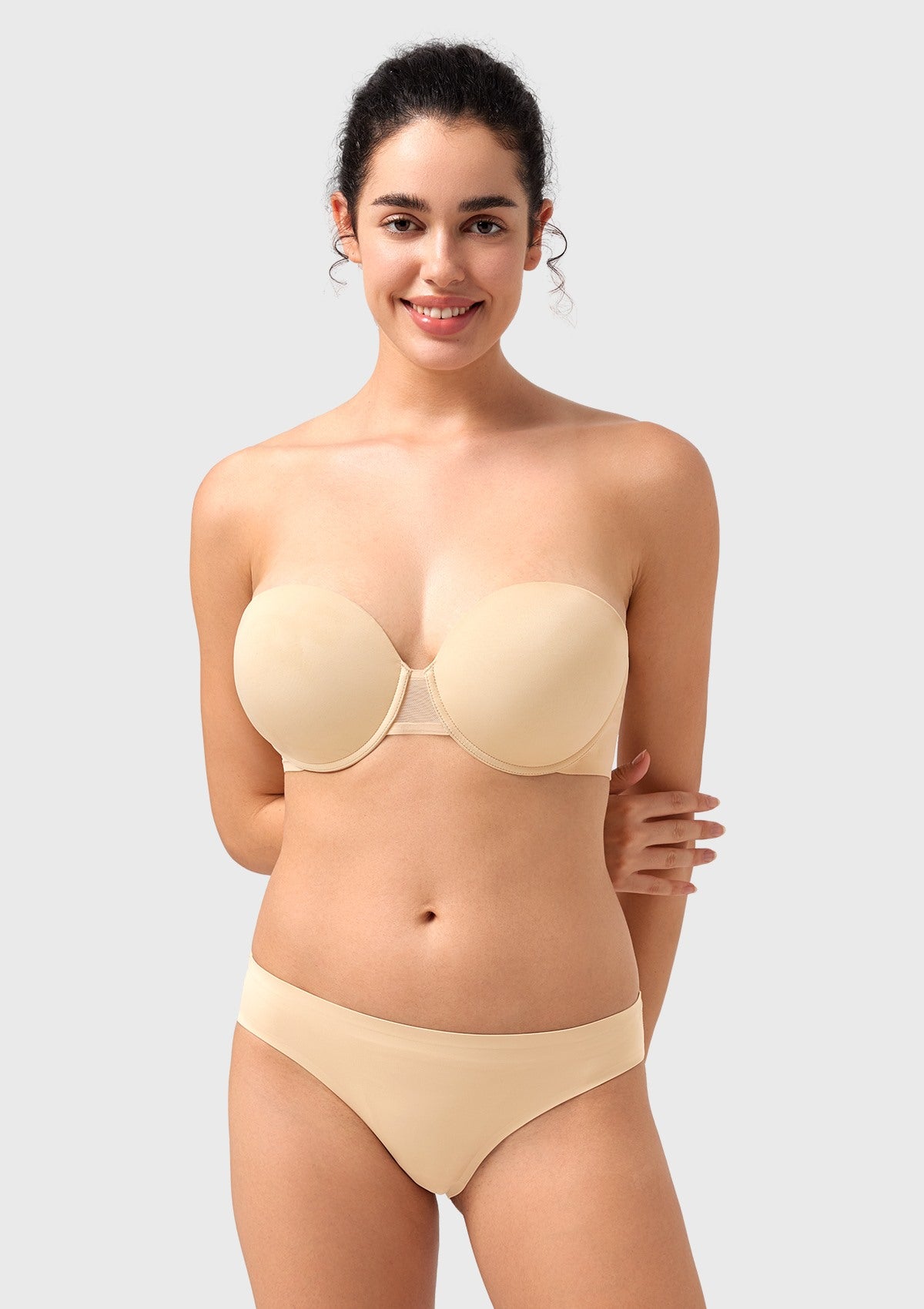 Front view of the nude seamless push-up strapless bra, offering a flawless, invisible lift for your favorite shoulder-baring outfits.