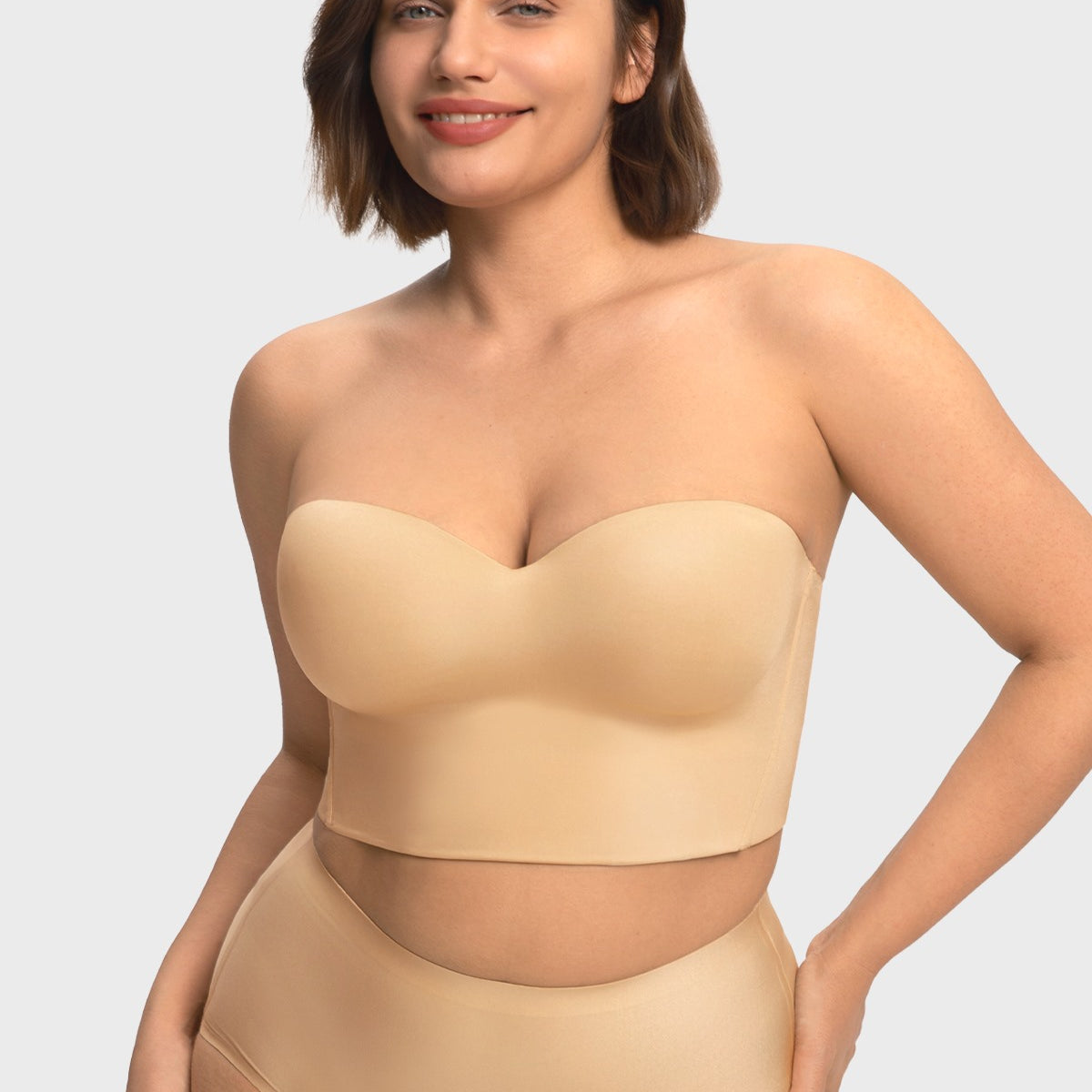Front view of the HSIA nude seamless strapless corset bra, providing a flawless and invisible foundation under form-fitting clothing.
