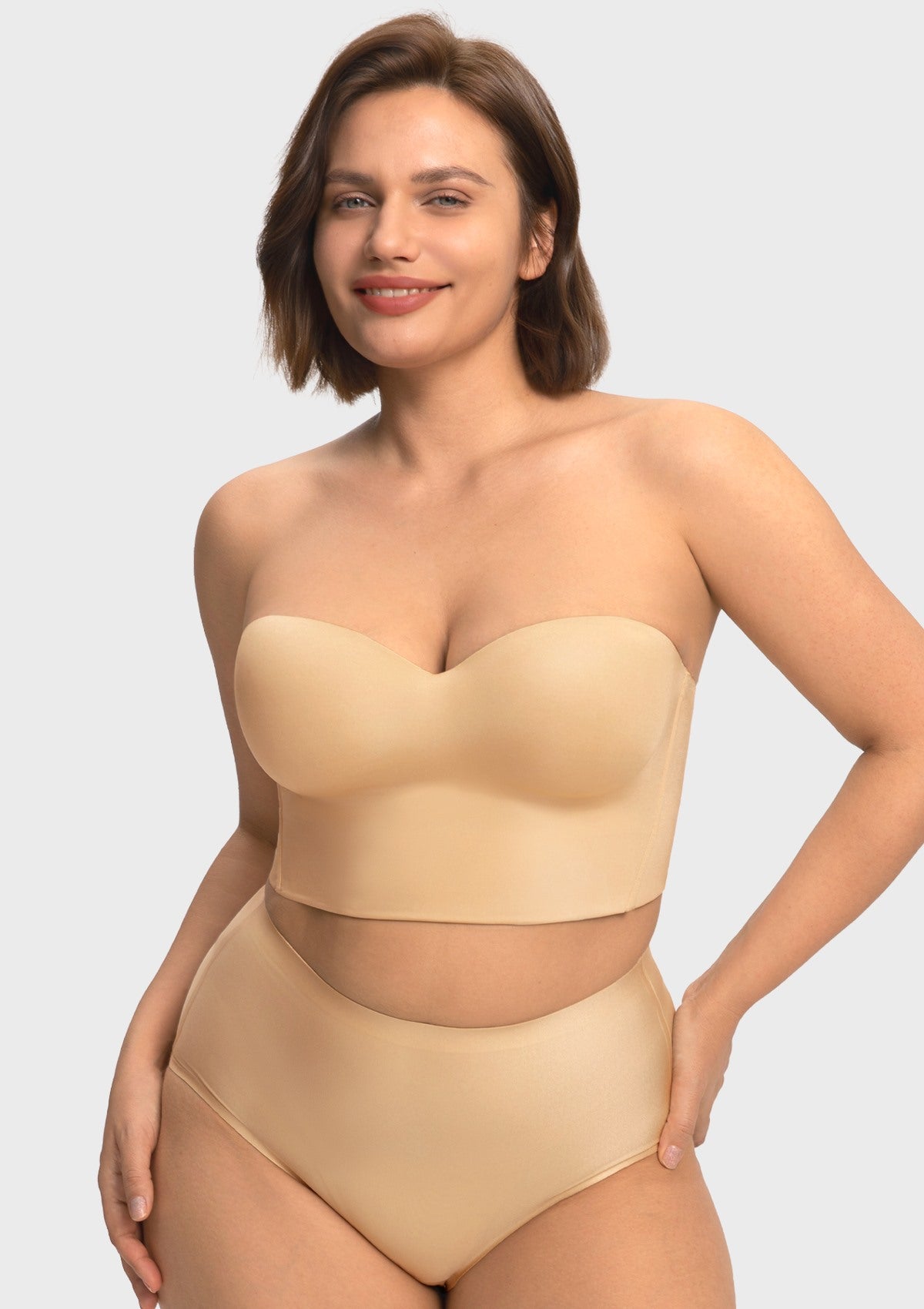 Front view of the HSIA nude seamless strapless corset bra, providing a flawless and invisible foundation under form-fitting clothing.