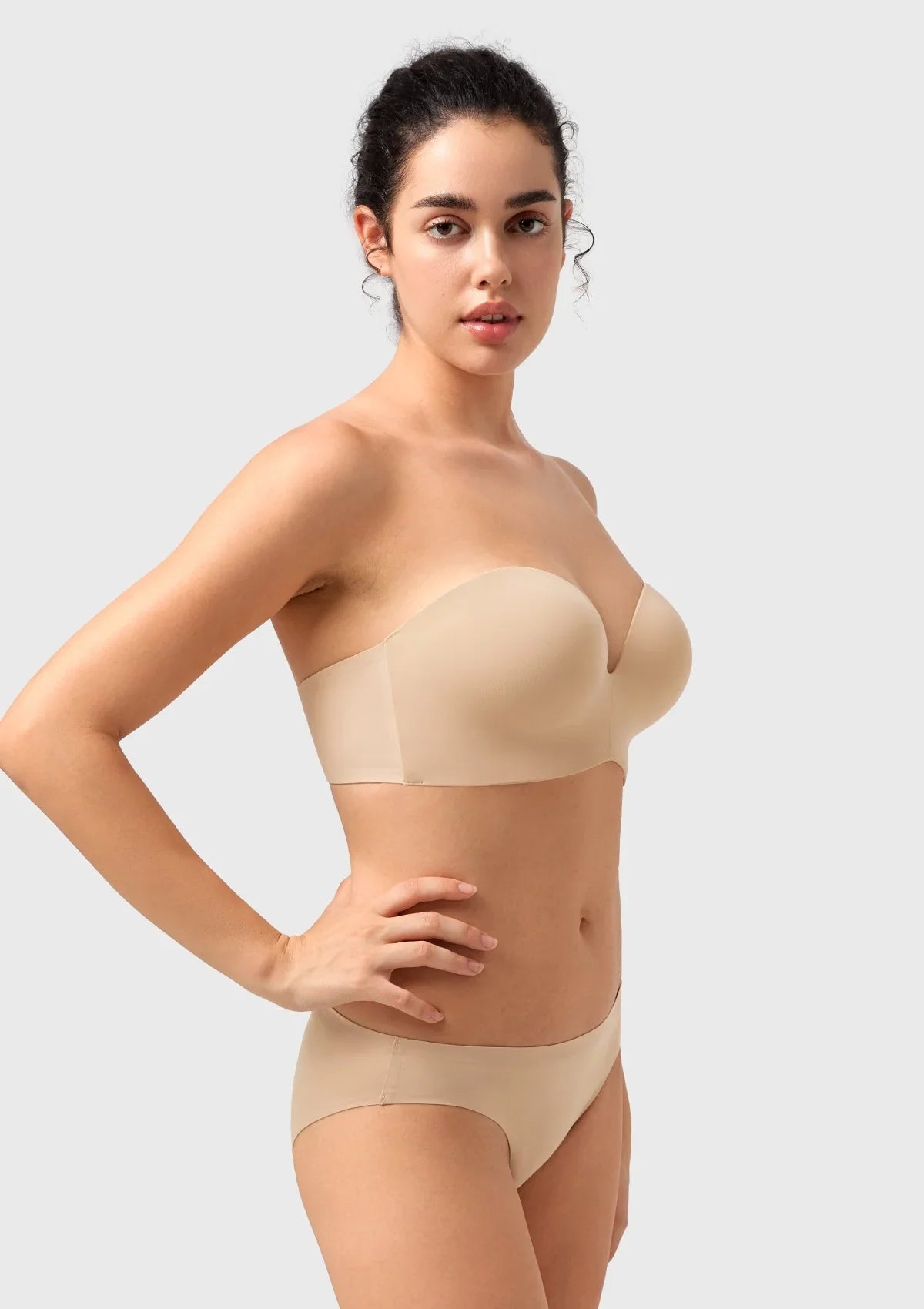 45-degree angle of the nude wireless push up bra, showcasing the natural lift and built-in hidden support tailored for a small chest.