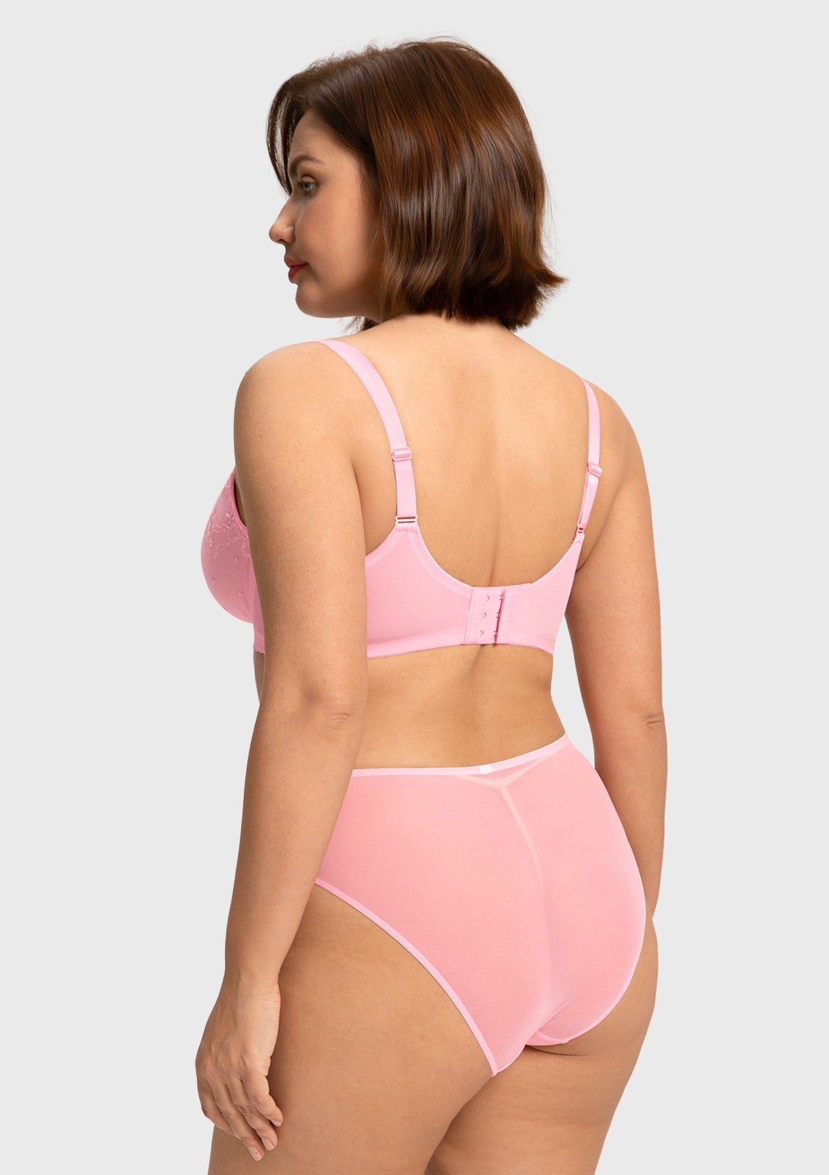 Rear view of the peach pink breathable support bra, featuring size-graded straps designed to banish shoulder pain and red marks.