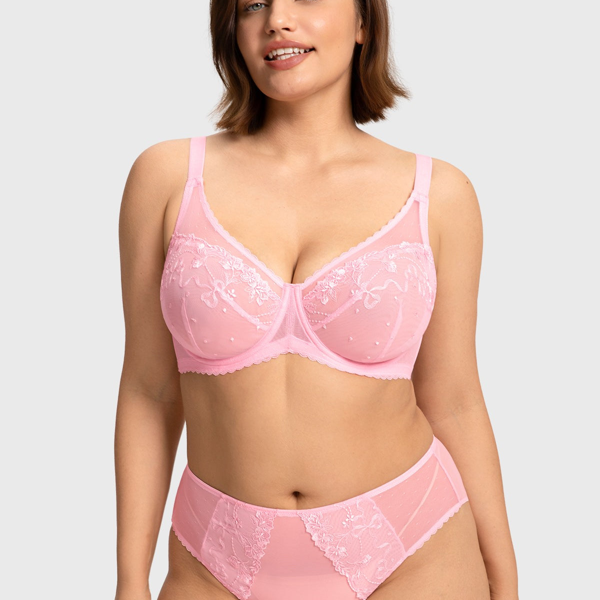 Front view of the peach pink romantic lace full coverage bra, offering a gentle adaptive shield that flawlessly eliminates the quad-boob effect.