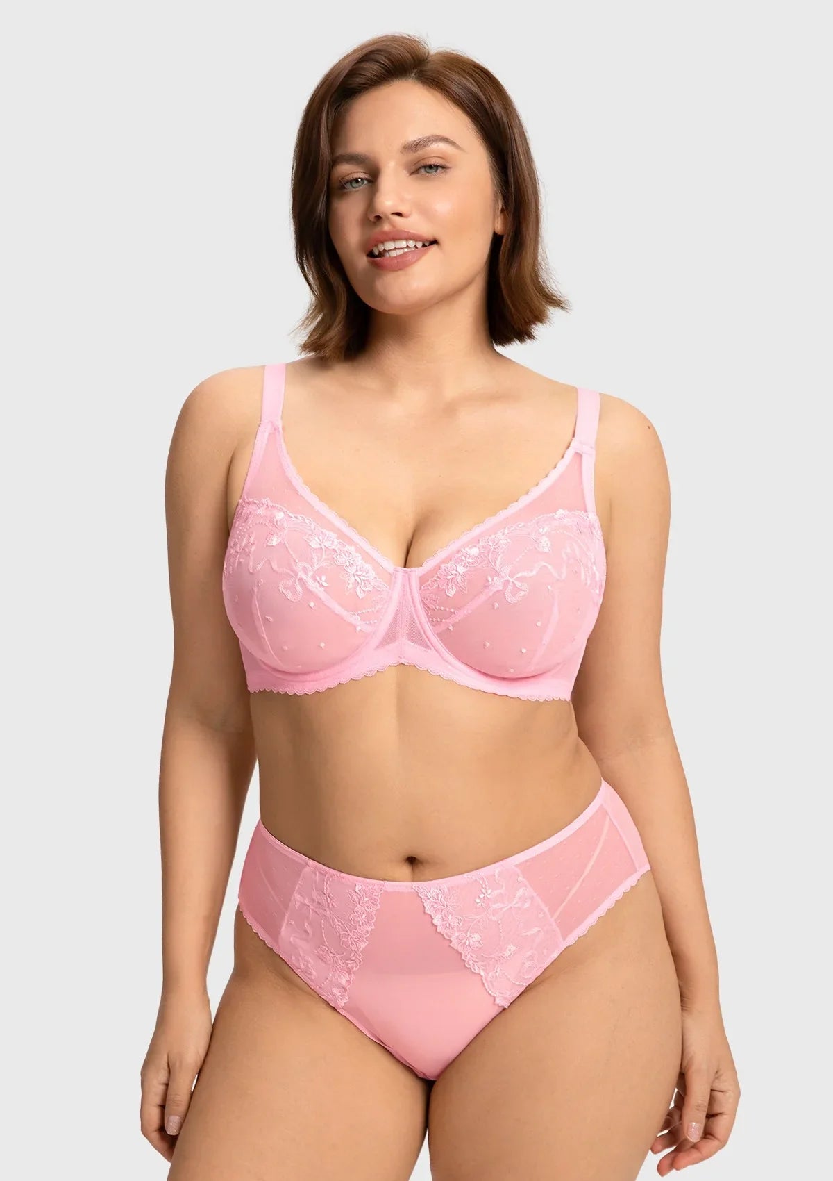 Front view of the peach pink romantic lace full coverage bra, offering a gentle adaptive shield that flawlessly eliminates the quad-boob effect.