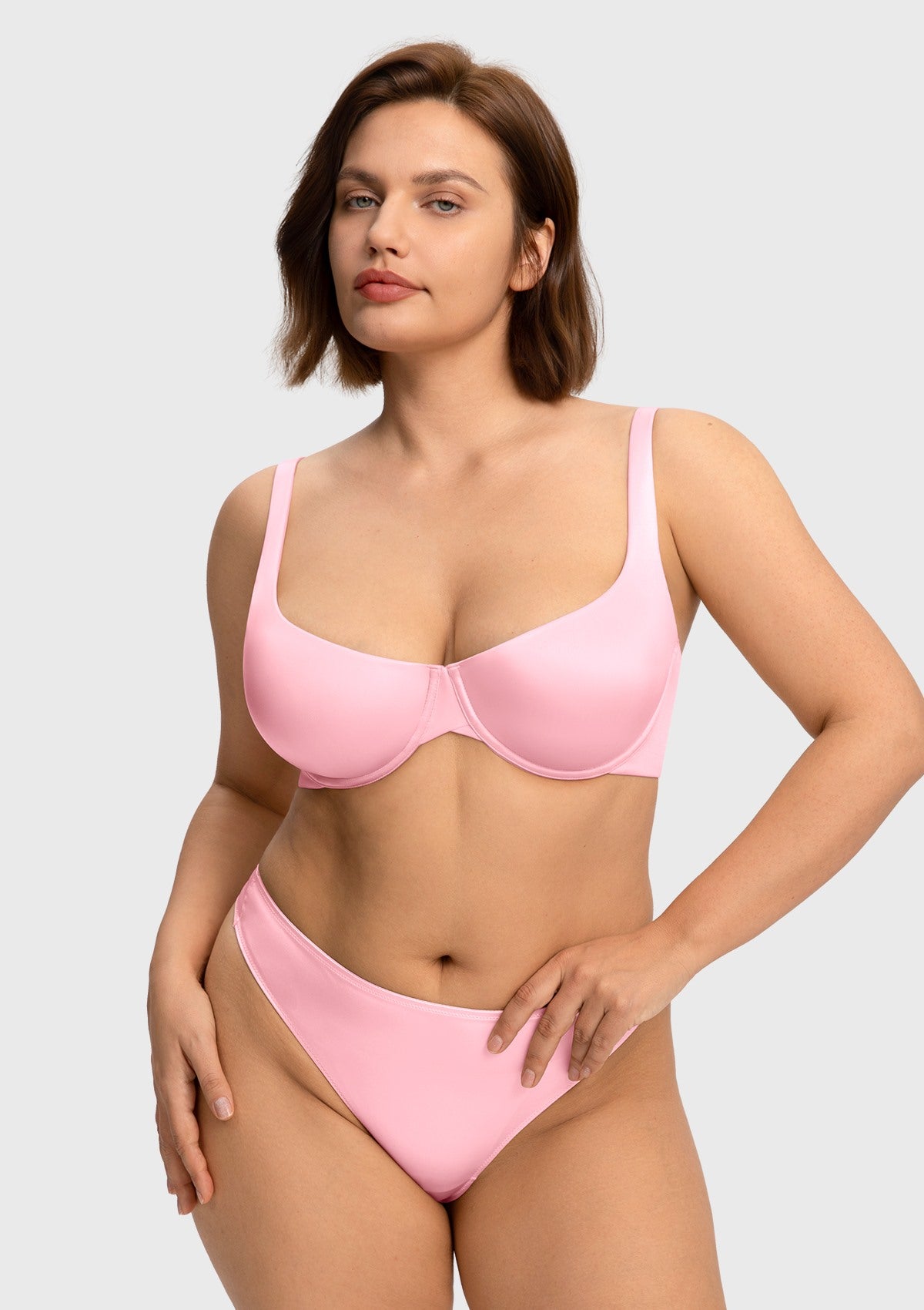 Front view of the Victoria pink romantic satin T-shirt bra, offering a beautiful, natural shape and completely invisible look under tight tops.