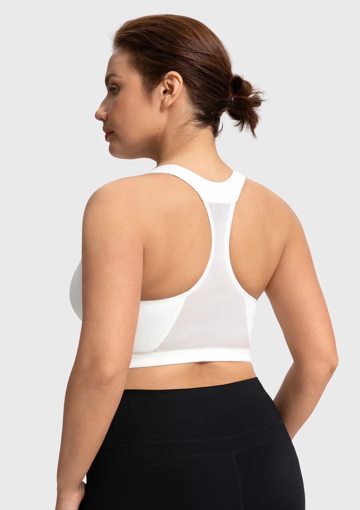 Back view highlighting the breathable mesh racerback design of the white workout top FYT0224