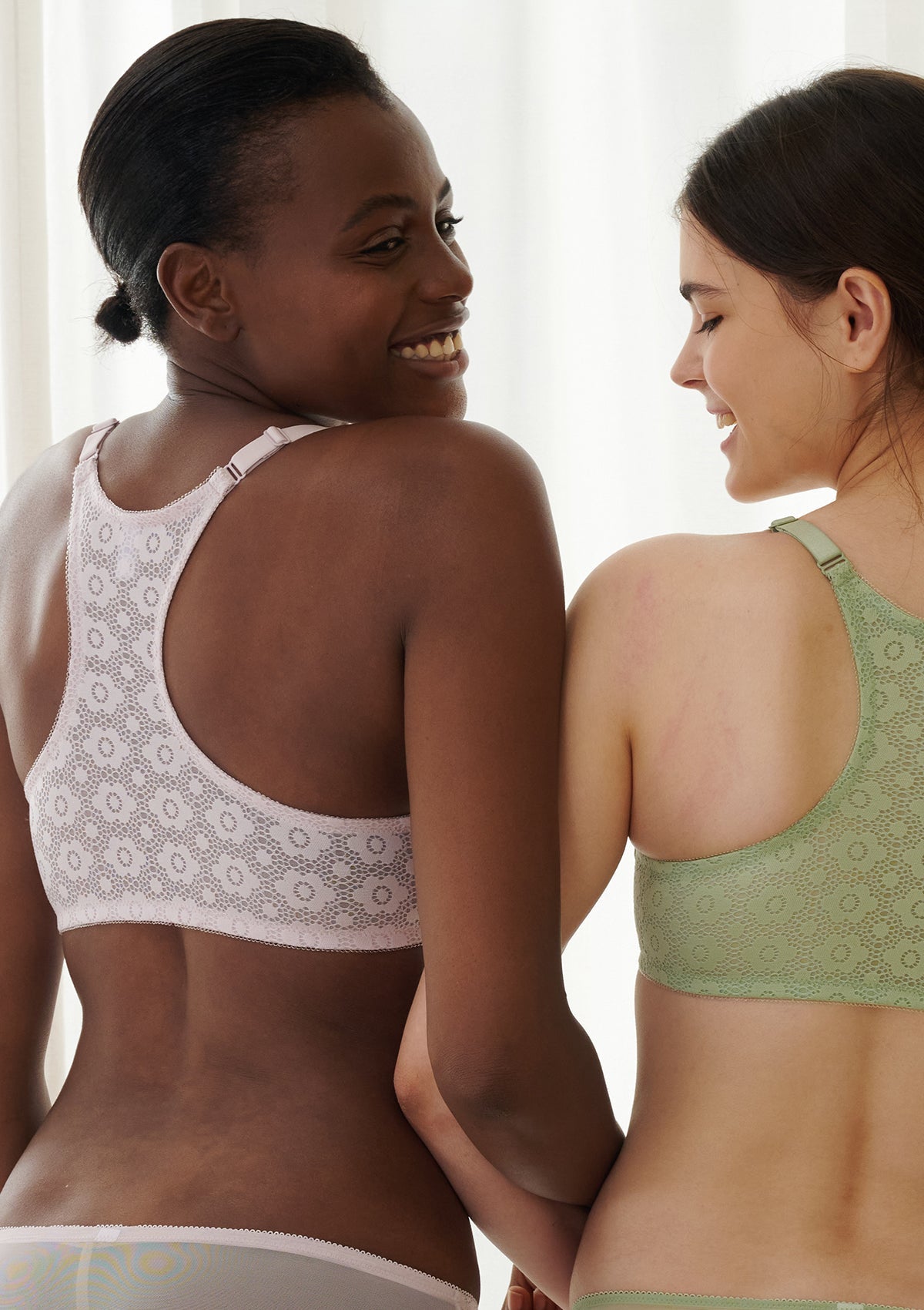 Serena front-close lace-back underwire bra in sage green, back view showing racerback eyelet lace design with adjustable straps