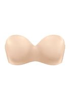 High-resolution 3D shot of the best nude strapless bra for a heavy bust, highlighting the invisible one-piece molded cup and eco-friendly double-stretch fabric.