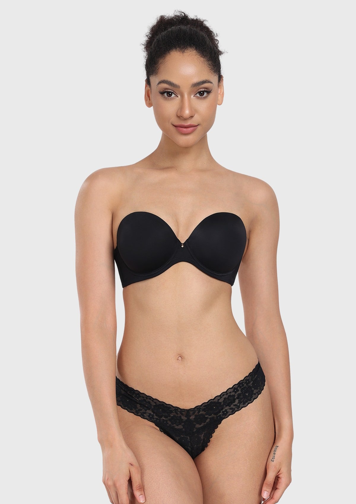 Front view of the black strapless bra, offering elegant lift and secure containment as the perfect bra for off the shoulder dress and evening wear.