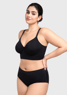 45-degree angle showing how the black full figure bra perfectly centers curves with built-in mesh side support