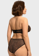 Back view of the black leopard strapless underwire bra showing the smoothing U-back band