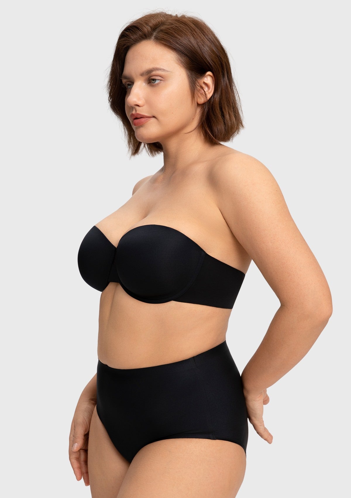 Side profile of the black lightlined demi strapless bra, expertly crafted to naturally center and shape full figures without added bulk.