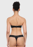 Back view of the black seamless strapless bra, demonstrating the smooth, highly breathable mesh wings that anchor firmly to the body.
