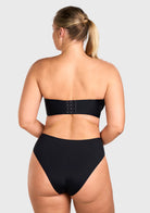Back view highlighting the wide non-slip band on the black silicone-free strapless bra