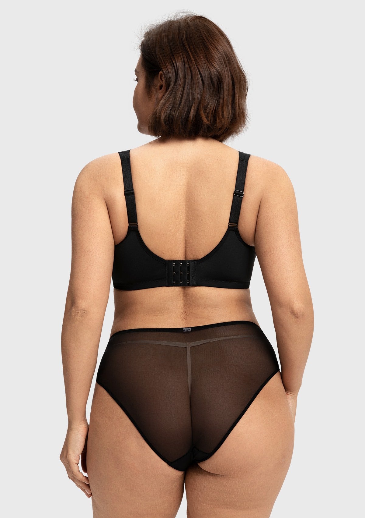 Back view of the black smoothing back full coverage bra, showcasing the secure multi-row hook closure that scales perfectly with your cup size.
