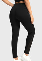 Back view of the black high-rise activewear leggings demonstrating a secure, squat-proof fit that stays in place during any movement.